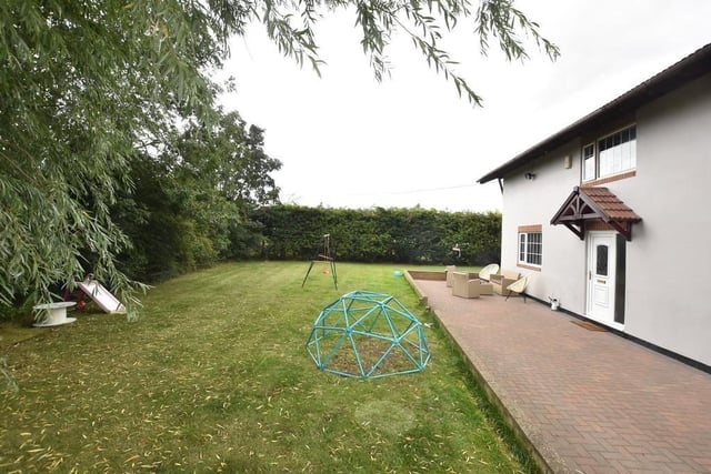 The property includes gardens to all sides and provides excellent on-site driveway parking.