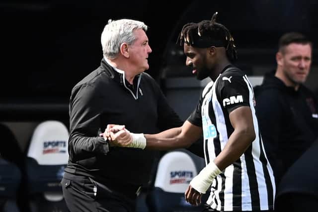 Steve Bruce and Allan Saint-Maximin.
