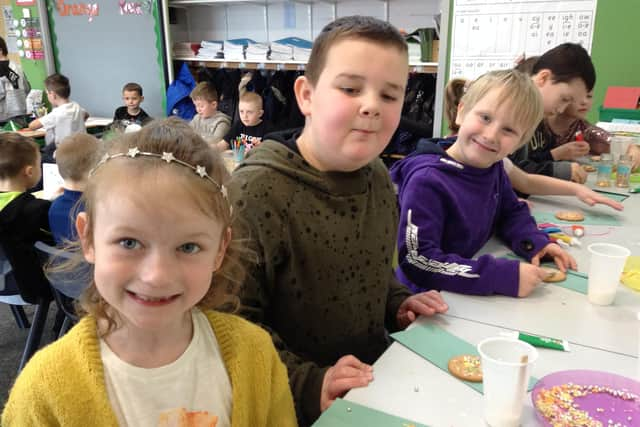 Some of the children decorating their biscuits.