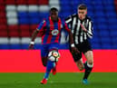 Joseph Hungbo of Crystal Palace avoids a challenge from Lewis Cass of Newcastle during the FA Youth Cup Fourth Round match between Crystal Palace and Newcastle United at Selhurst Park on January 19, 2018 in London, England.