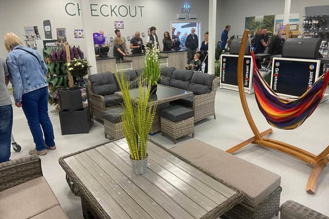 Customers make their way inside Green Fingers garden centre on opening day.