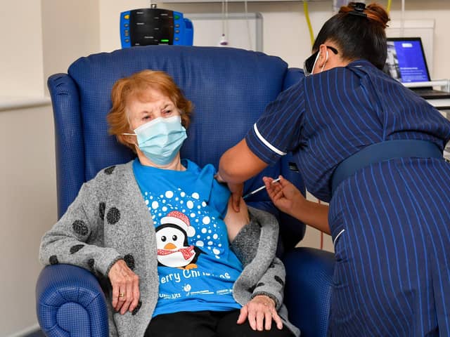 Margaret Keenan, 90, is the first patient in the United Kingdom to receive the Pfizer/BioNtech covid-19 vaccine at University Hospital, Coventry, administered by nurse May Parsons, at the start of the largest ever immunisation programme in the UK's history.