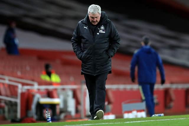Newcastle United's English head coach Steve Bruce reacts during the English Premier League football match between Arsenal and Newcastle United at the Emirates Stadium in London on January 18, 2021. (Photo by Adam Davy / POOL / AFP) / RESTRICTED TO EDITORIAL USE. No use with unauthorized audio, video, data, fixture lists, club/league logos or 'live' services. Online in-match use limited to 120 images. An additional 40 images may be used in extra time. No video emulation. Social media in-match use limited to 120 images. An additional 40 images may be used in extra time. No use in betting publications, games or single club/league/player publications. / (Photo by ADAM DAVY/POOL/AFP via Getty Images)