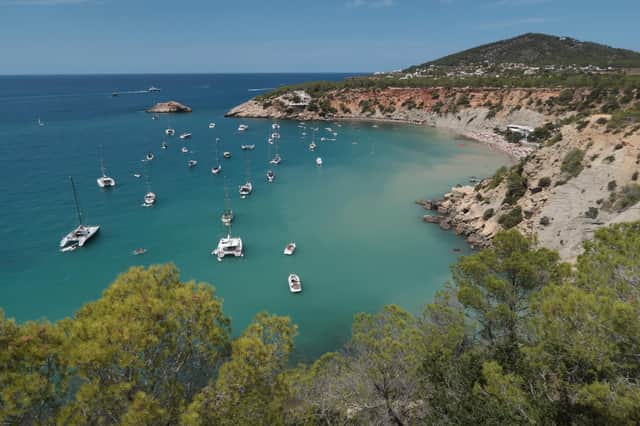 Many holidays will be cancelled due to the coronavirus outbreak - but not everyone will be entitled to a refund. (Photo of Ibiza by Getty Images)