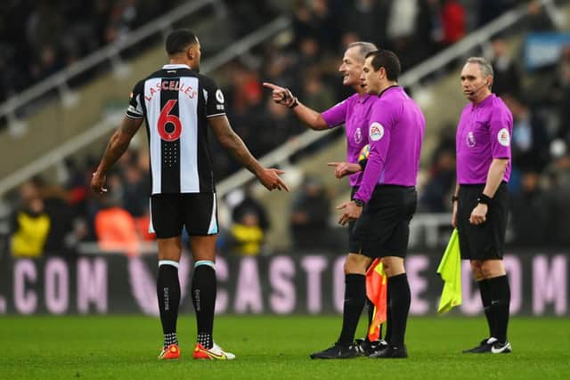 Newcastle felt aggrieved when they were not awarded a penalty by Martin Atkinson against Manchester City (Photo by Stu Forster/Getty Images)