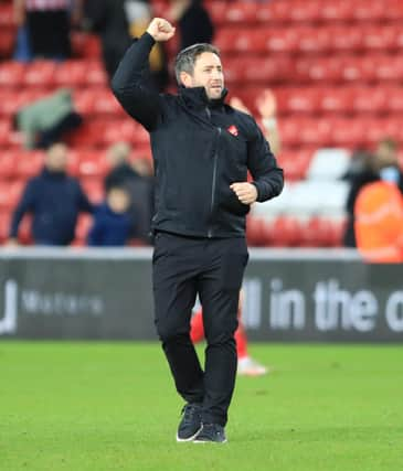 Lee Johnson celebrates at full time