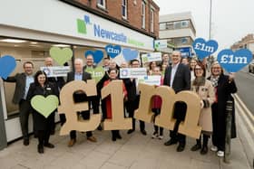 Newcastle Building Society’s chief executive officer, Andrew Haigh, and its Hartlepool branch manager, Carrieanne Wilford, celebrate the Society’s latest donation alongside Society colleagues and representatives from the Community Foundation Tyne & Wear and Northumberland.