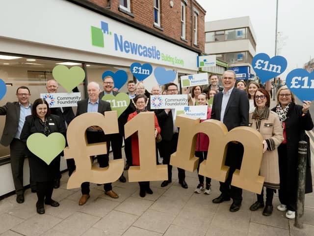 Newcastle Building Society’s chief executive officer, Andrew Haigh, and its Hartlepool branch manager, Carrieanne Wilford, celebrate the Society’s latest donation alongside Society colleagues and representatives from the Community Foundation Tyne & Wear and Northumberland.