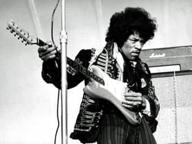 American singer and guitarist Jimi Hendrix performs on stage without the distraction of Netflix.