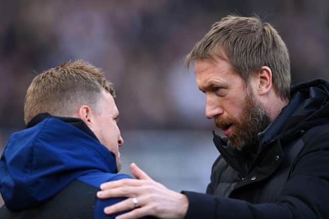 Eddie Howe, Manager of Newcastle United embraces Graham Potter, Manager of Brighton & Hove Albion prior to the Premier League match between Newcastle United and Brighton & Hove Albion at St. James Park on March 05, 2022 in Newcastle upon Tyne, England. (Photo by Stu Forster/Getty Images)