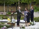 MANCHESTER, UNITED KINGDOM - MAY 10: The memorial designer Andy Thomson, left, the director of BCA Landscape and Joanne Roney, third left, the chief executive of Manchester City Council show Prince William, Duke of Cambridge and his wife Catherine, Duchess Of Cambridge around as they attend the launch of the Glade of Light Memorial garden, outside Manchester Cathedral on May 10, 2022 in Manchester, England.  The Glade of Light Memorial commemorates the victims of the terrorist attack that took place after an Ariana Grande concert at Manchester Arena on May 22, 2017.  (Photo by Jon Super-WPA Pool/Getty Images)