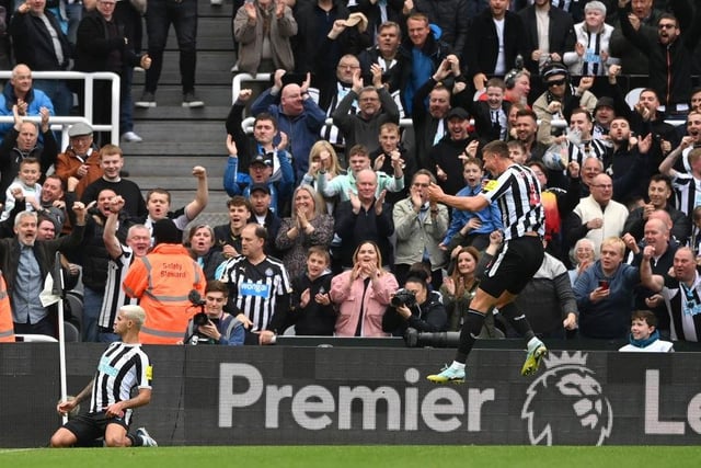Newcastle fans celebrate Bruno Guimaraes' stunning strike against Brentford (Photo by Stu Forster/Getty Images)