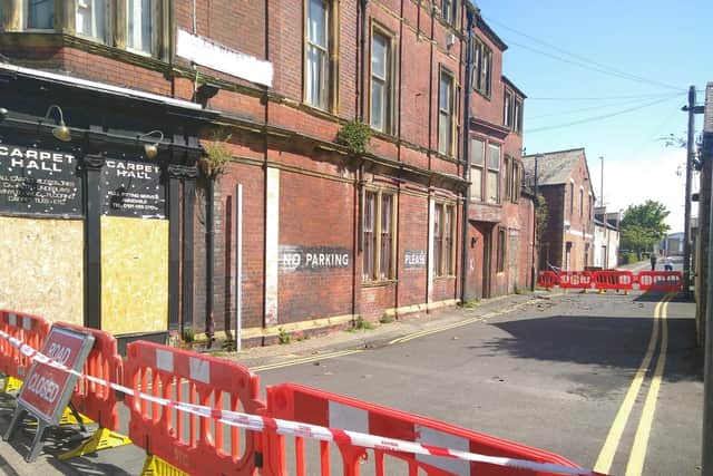 The scene outside the Victoria Hall on Sunday morning.