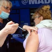 Kathleen Brown receives her covid booster vaccination at the covid bus in King Street, South Shields, in October 2021.