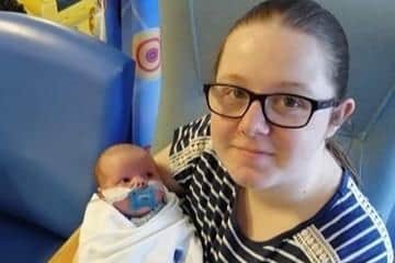Baby Anthony James Carr with mum Georgia Barker.