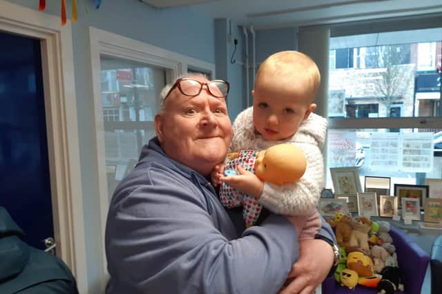 Joseph Pilkington, 60, with granddaughter Alula, aged one.