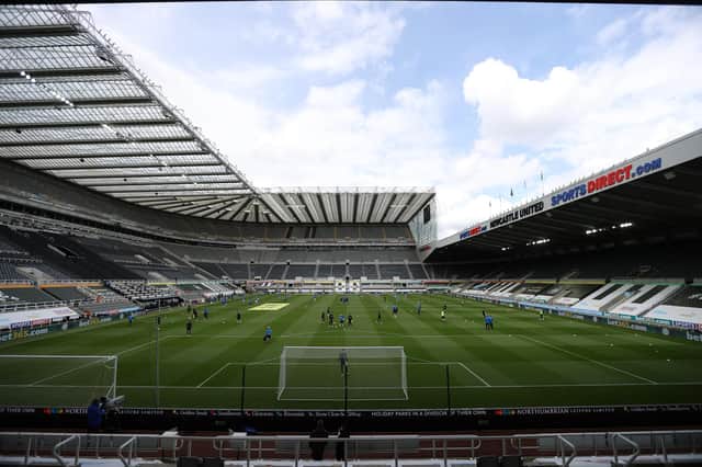 General view inside the stadium as both teams warm-up prior to the Premier League match between Newcastle United and Arsenal at St. James Park.