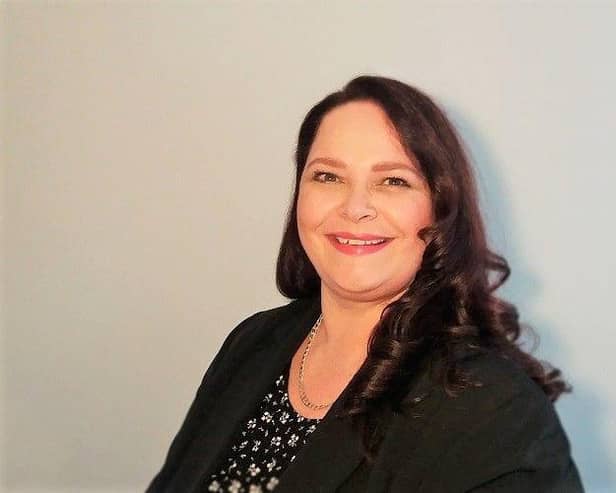 Dr Erica De Lange