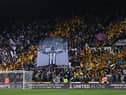 Fans of Newcastle United display flags in support of Allan Saint-Maximin prior to the match with Crystal Palace at St. James Park (Photo by Stu Forster/Getty Images)