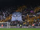 Fans of Newcastle United display flags in support of Allan Saint-Maximin prior to the match with Crystal Palace at St. James Park (Photo by Stu Forster/Getty Images)