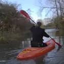 Police kayak to reach a drink-driver whose car got stuck in floodwater 
