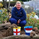 Drusillas Park’s Gemma Romanis with the 'mystic meerkats'.
