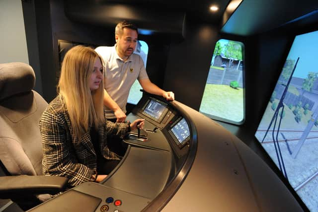 Reporter Georgina Cutler learns hows to drive a metro train.