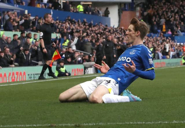 Anthony Gordon of Everton celebrates scoring their first goal during the Premier League match between Everton and Manchester United at Goodison Park on April 09, 2022 in Liverpool, England. (Photo by Tom Purslow/Manchester United via Getty Images)