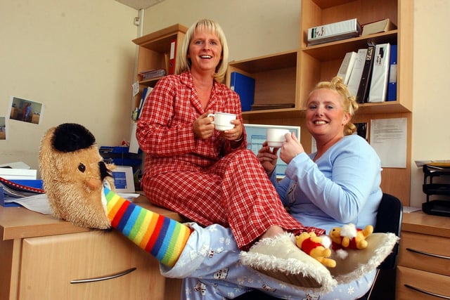 Customer care staff Elaine Peterson and Gemma Oman wore their pyjamas to work at Roundels Kitchens in Harton Lane for Children In Need in 2005.