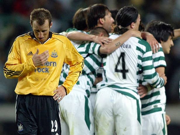 Sporting Lisbon's players celebrate their victory next Newcastle United's Lee Bowyer in April 2005.