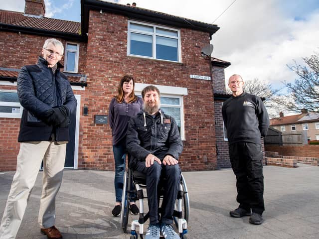 (l-r) Neil Turner, Director- Howarth Litchfield accompanies Andrea Burns and Jason Burns, war veteran plus Jonathan Ball, Chief Executive- RMA- The Royal Marines Charity for a first look around their new home