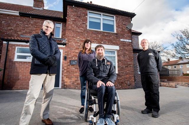 (l-r) Neil Turner, Director- Howarth Litchfield accompanies Andrea Burns and Jason Burns, war veteran plus Jonathan Ball, Chief Executive- RMA- The Royal Marines Charity for a first look around their new home