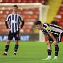 Newcastle United's Joe White catches his breath at Oakwell.