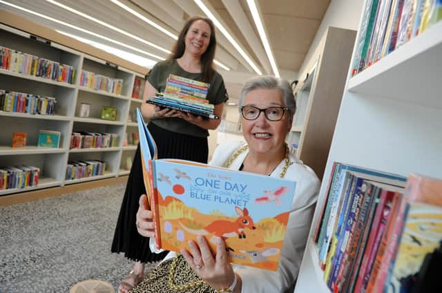 The Mayor Cllr Pat Hay with librarian Jolene Dunbar at The Word, South Shields, launching Summer Reading Challenge - Wild World Hero's.