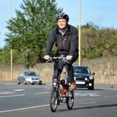 Cyclist Jonathan Barlow using the cycle lanes around The Arches, Tyne Dock.