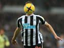 Newcastle United's New Zealand striker Chris Wood runs with the ball during the English Premier League football match between Newcastle United and Leeds United at St James' Park in Newcastle-upon-Tyne, north east England on December 31, 2022.(Photo by LINDSEY PARNABY/AFP via Getty Images)