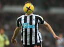 Newcastle United's New Zealand striker Chris Wood runs with the ball during the English Premier League football match between Newcastle United and Leeds United at St James' Park in Newcastle-upon-Tyne, north east England on December 31, 2022.(Photo by LINDSEY PARNABY/AFP via Getty Images)