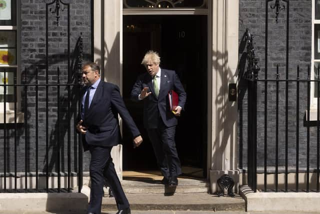 Boris Johnson leaving 10 Downing Street to Prime Ministers Questions.