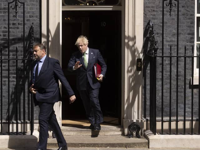 Boris Johnson leaving 10 Downing Street to Prime Ministers Questions.