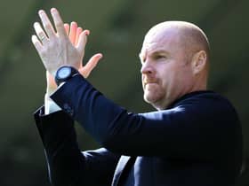 Sean Dyche, Manager of Burnley applauds the fans prior to the Premier League match between Norwich City and Burnley at Carrow Road on April 10, 2022 in Norwich, England. (Photo by Stephen Pond/Getty Images)