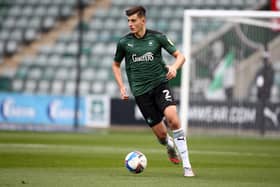 PLYMOUTH, ENGLAND - OCTOBER 17:  Kell Watts of Plymouth Argyle in action during the Sky Bet League One match between Plymouth Argyle and Northampton Town at Home Park on October 17, 2020 in Plymouth, England. (Photo by Pete Norton/Getty Images)
