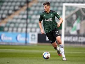PLYMOUTH, ENGLAND - OCTOBER 17:  Kell Watts of Plymouth Argyle in action during the Sky Bet League One match between Plymouth Argyle and Northampton Town at Home Park on October 17, 2020 in Plymouth, England. (Photo by Pete Norton/Getty Images)