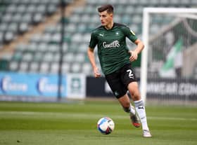 PLYMOUTH, ENGLAND - OCTOBER 17:  Kell Watts of Plymouth Argyle in action during the Sky Bet League One match between Plymouth Argyle and Northampton Town at Home Park on October 17, 2020 in Plymouth, England. (Photo by Pete Norton/Getty Images)