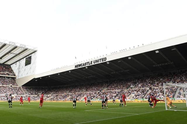 How has Newcastle United's defeat to Liverpool impacted the supercomputer's predictions for this season? (Photo by PAUL ELLIS/AFP via Getty Images)