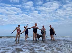 Sarah Thorell pictured with Helen Collins Lindy Woodrow Alison Symonds Norma Thompson along with Kipper the dog.