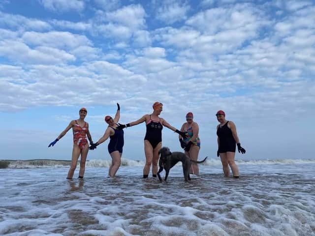Sarah Thorell pictured with Helen Collins Lindy Woodrow Alison Symonds Norma Thompson along with Kipper the dog.