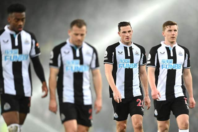 Newcastle striker Chris Wood (2nd R) and team mates react during the Premier League match between Everton  and  Newcastle United at Goodison Park on March 17, 2022 in Liverpool, England. (Photo by Stu Forster/Getty Images)