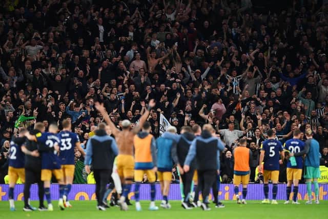 Newcastle United fans celebrate after their side's victory over Tottenham Hotspur last month.
