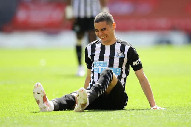 Miguel Almiron of Newcastle United reacts during the Premier League match between Liverpool and Newcastle United at Anfield on April 24, 2021 in Liverpool, England.