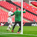 Hebburn Town's Thomas Potter (centre) shoots towards goal during the Buildbase FA Vase 2019/20 Final at Wembley Stadium, London. PA picture.